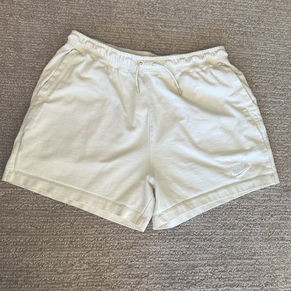 Nike Women’s cream shorts. Size medium.